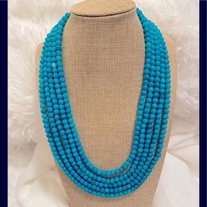 Multiple-strand turquoise glass bead necklace